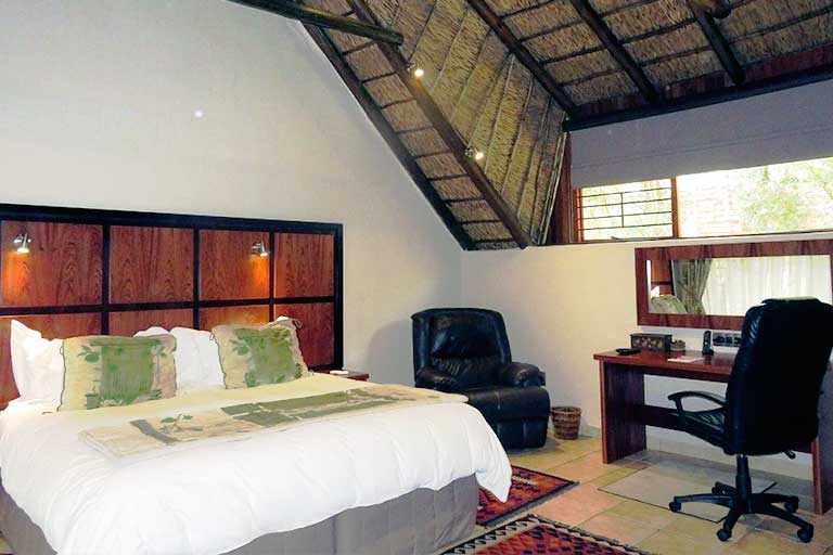wide-view-from-inside-one-of-the-luxury-double-rooms-at-tladi-lodge